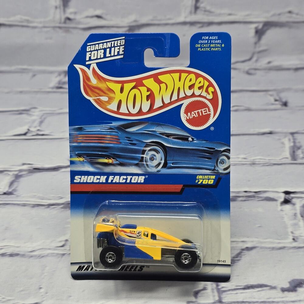 1997 Hot Wheels #700 Shock Factor Yellow/Blue NEW in Package